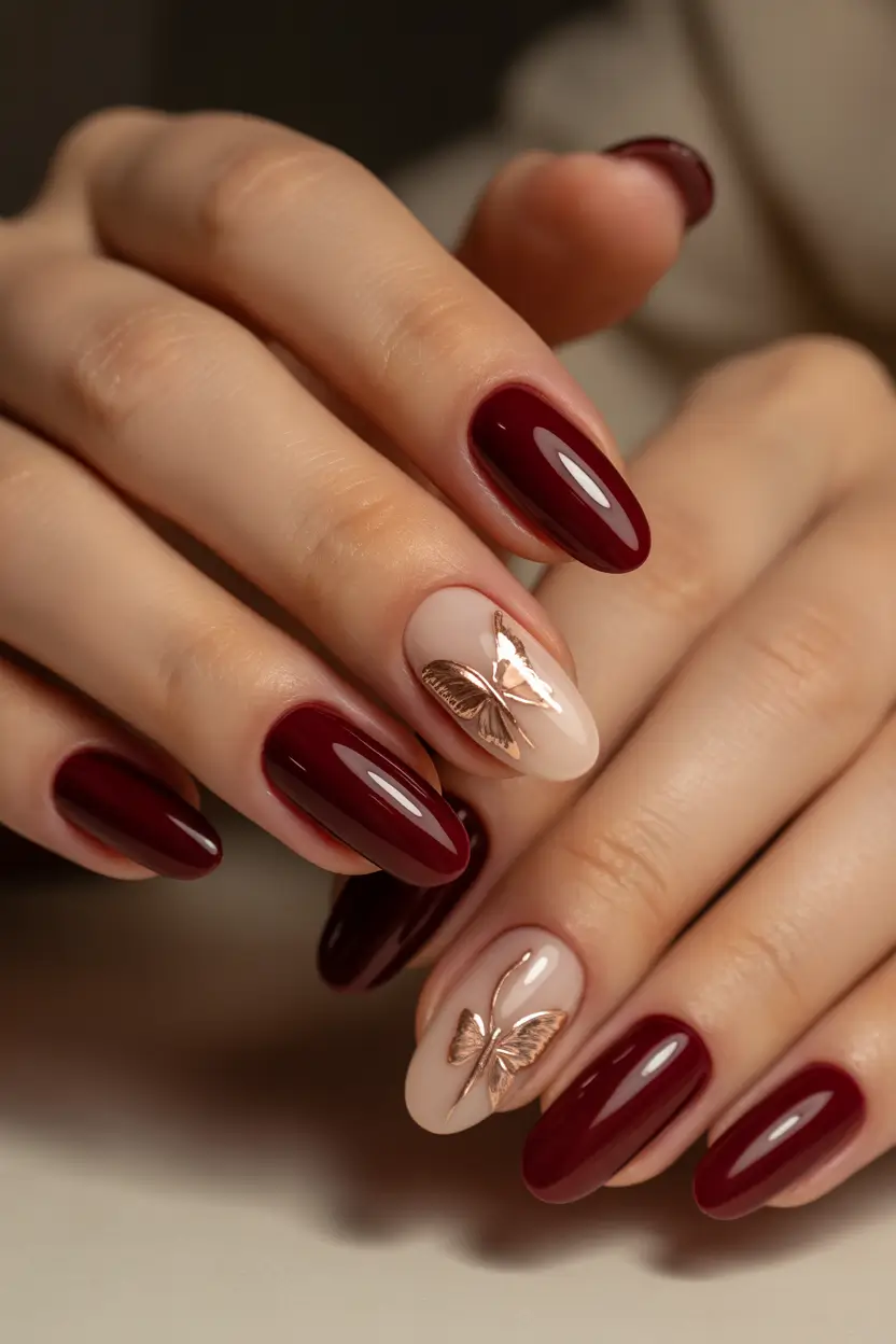 23 2025 Fall Nail Colors Trendy Shades – Wine Gloss With Rose-Gold Butterfly