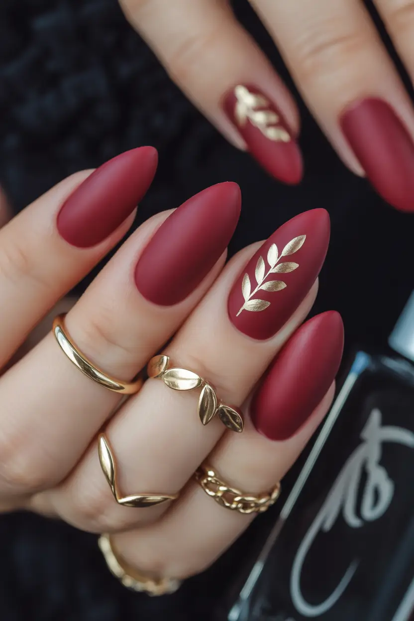 fall season nails - Velvet Merlot Almond with Golden Leaf