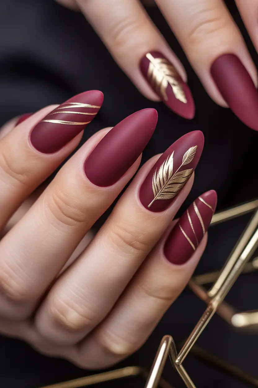 September nails design Crimson with Golden Feathers