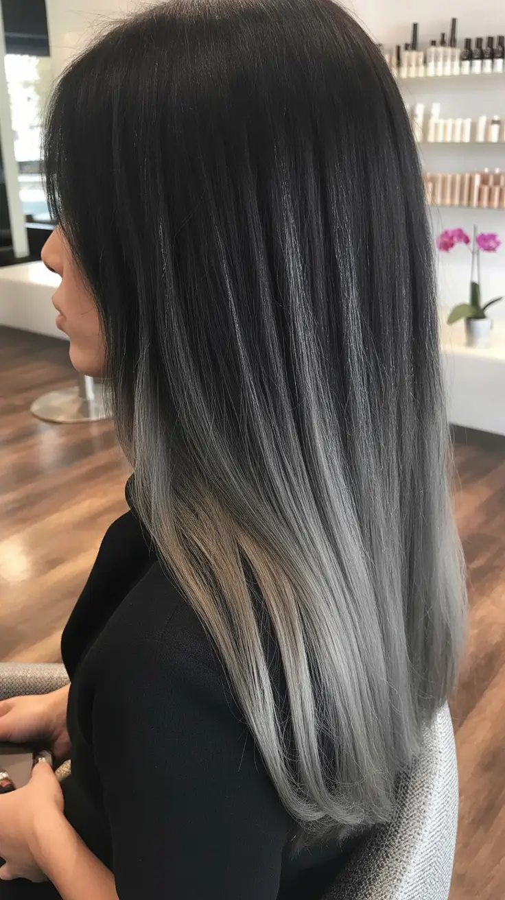 winter hair colors balayage Cool Charcoal Balayage with Sleek Finish