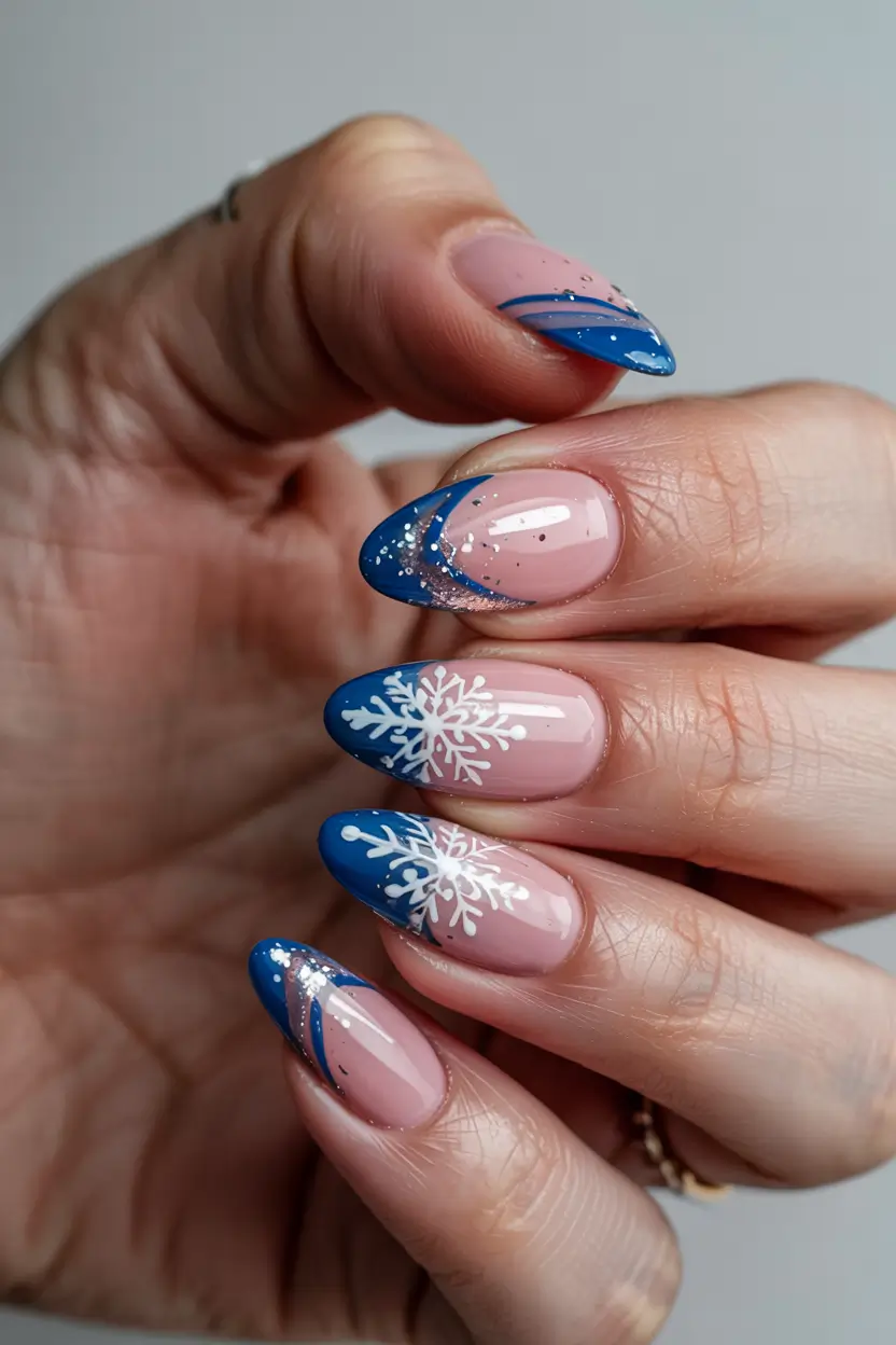 blue-winter-nails-2025-2026-Frost-Tipped-Elegance-with-Snowflake-Accents