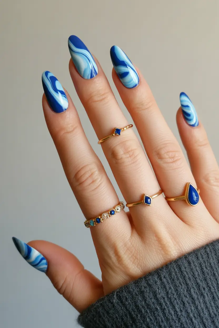 blue-winter-nails-2025-2026-Royal-Blue-Swirls-with-Artistic-Flair
