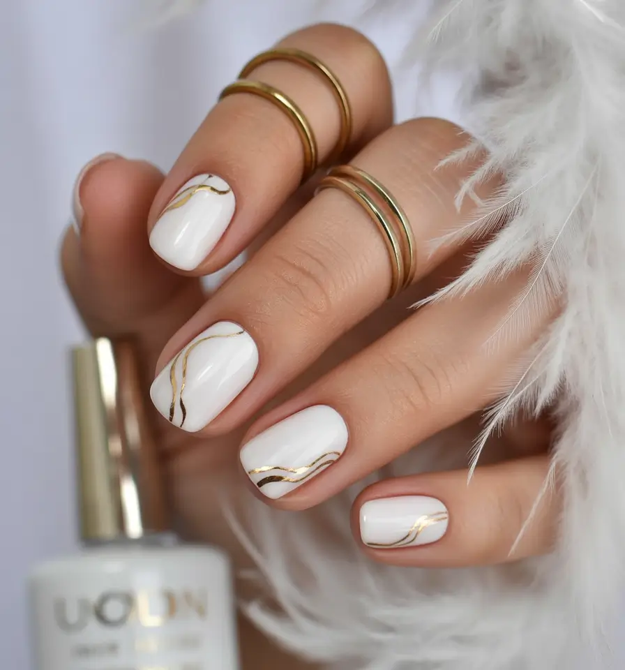 winter-nails-ideas-White-Gold-Elegance