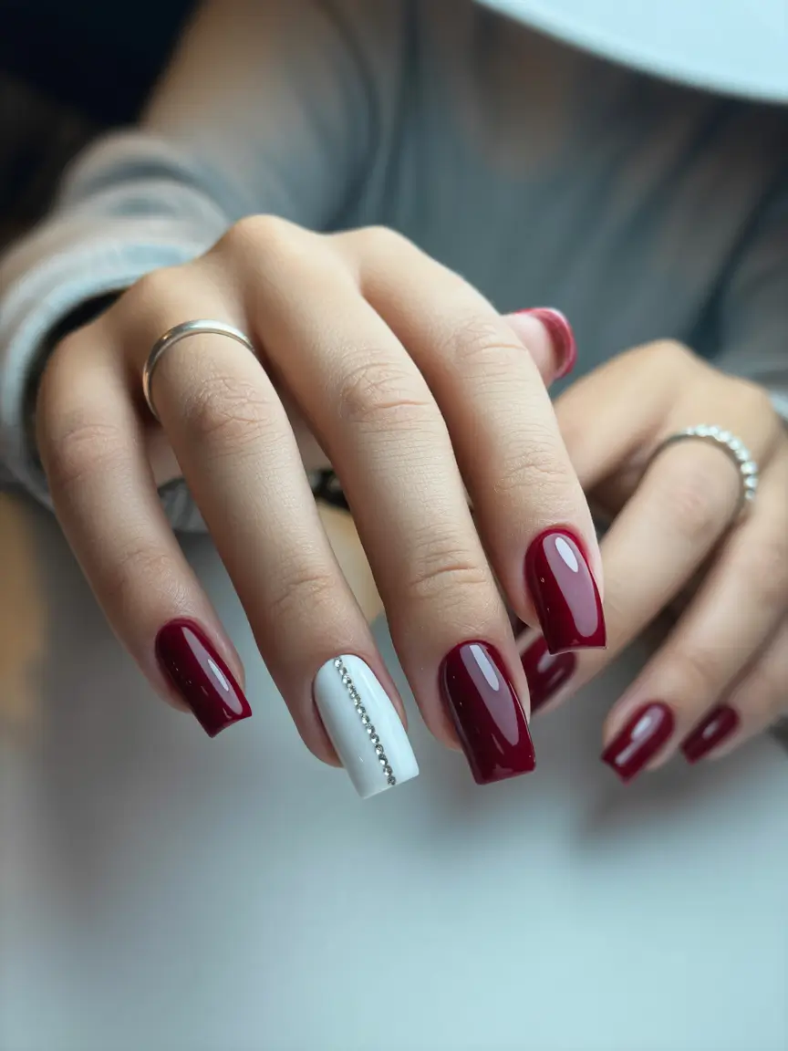 acrylic nails Classic Wine Red with a Clean Crystal Accent