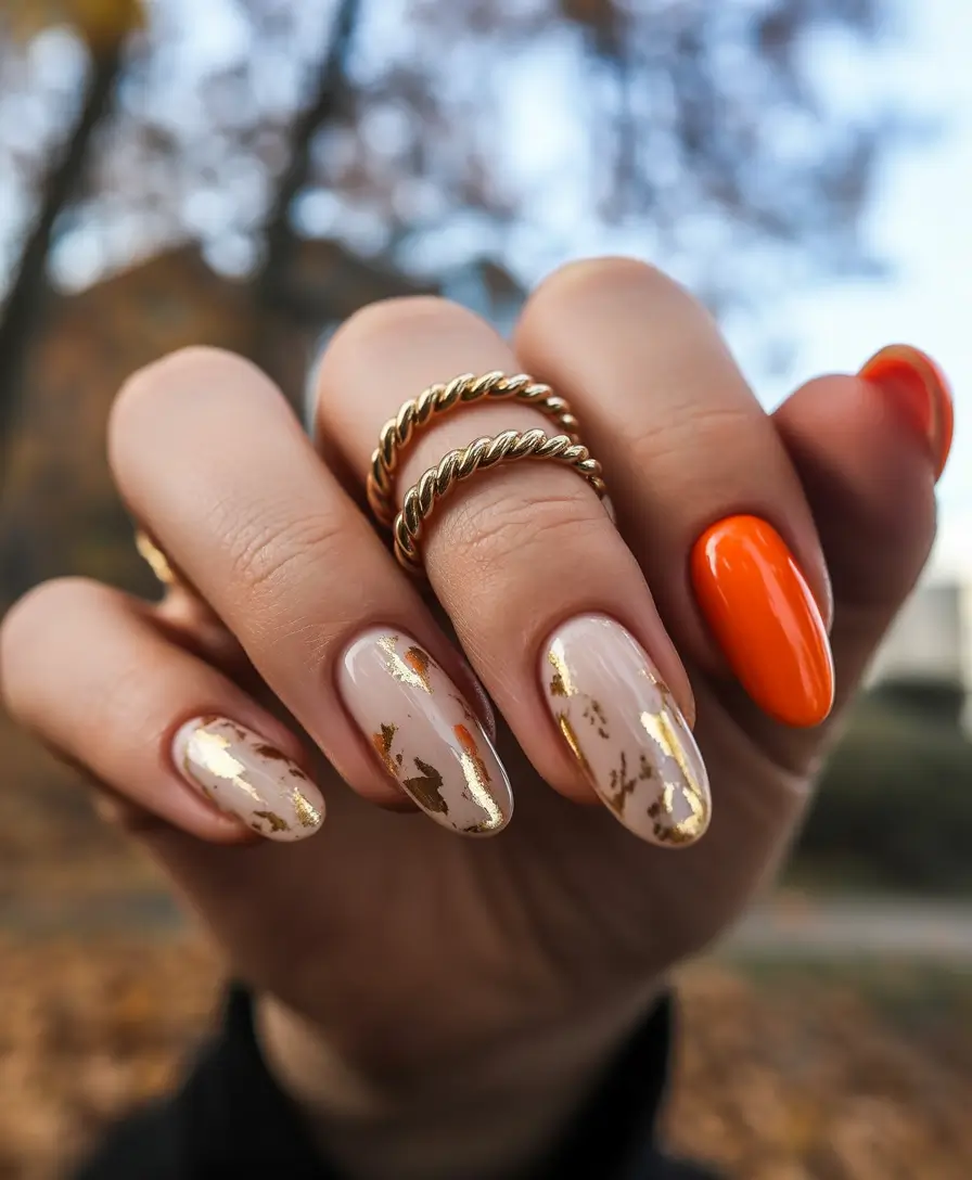 gold nails red and gold leaf designs