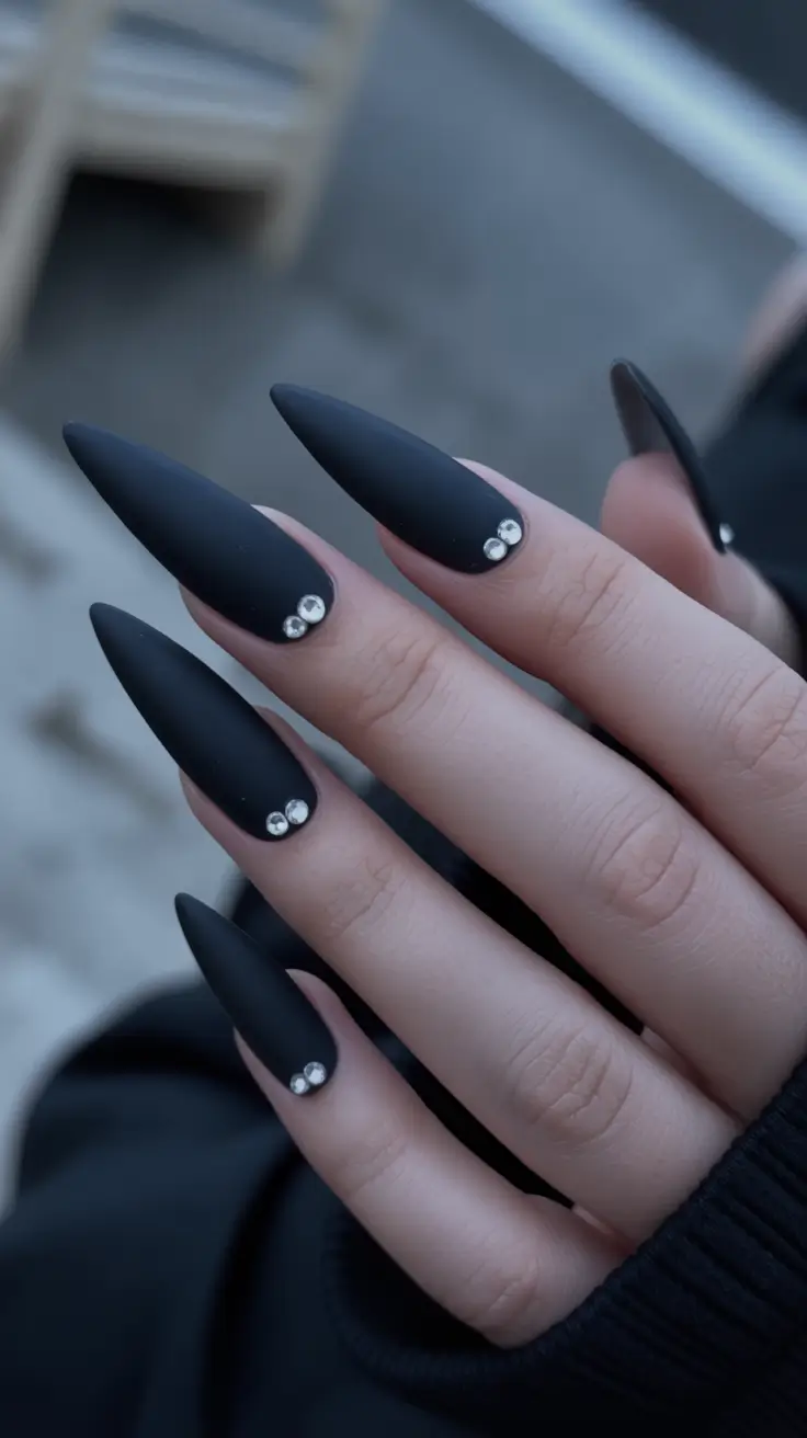 stiletto nails Matte Black Stiletto Nails with Minimal Crystal Accents