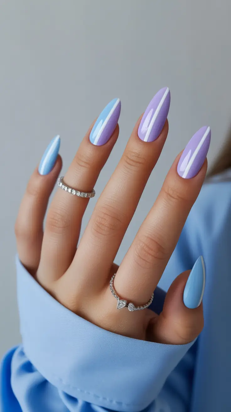 pastel spring gel nails art 2026 Glossy Pastel Almond with Minimal Vertical Accent Lines