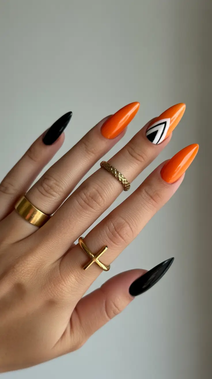 spring almond nails Bold Orange and Black Graphic Almond Nails