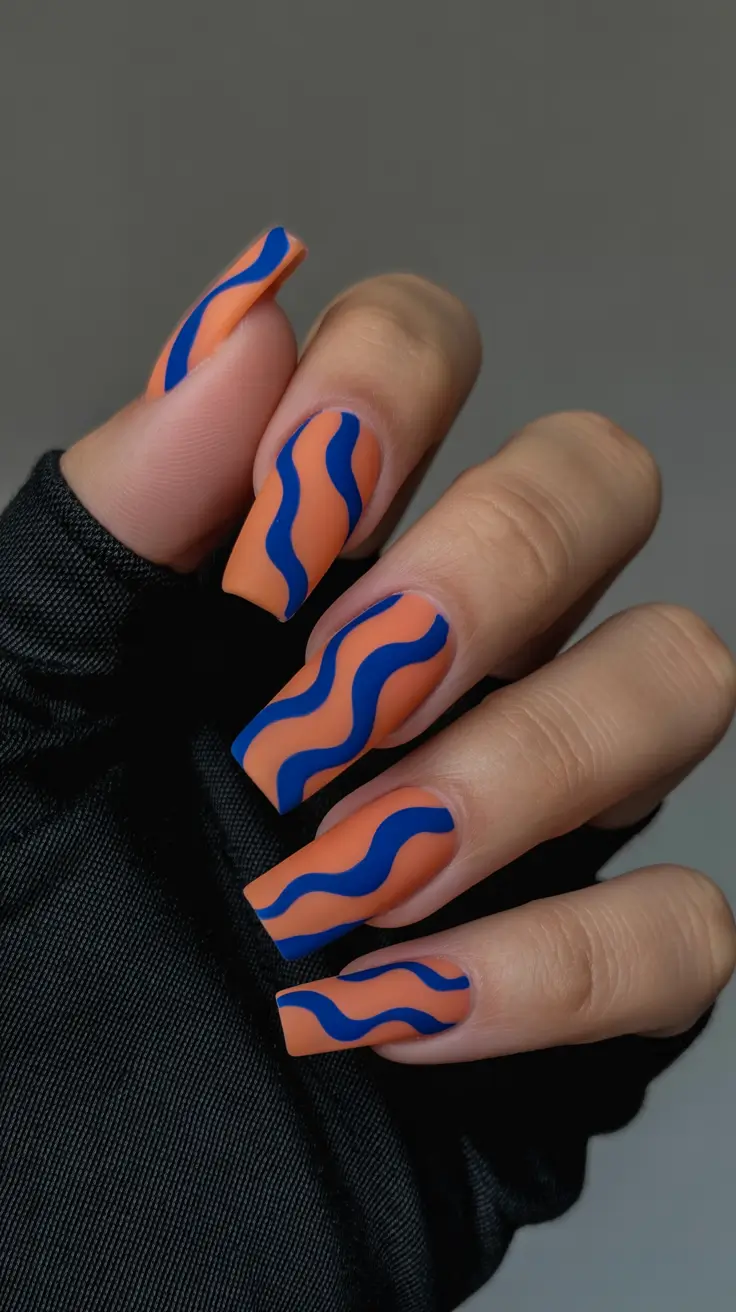 spring nails coffin Orange and Blue Wavy Coffin Nails With Retro Spring Movement