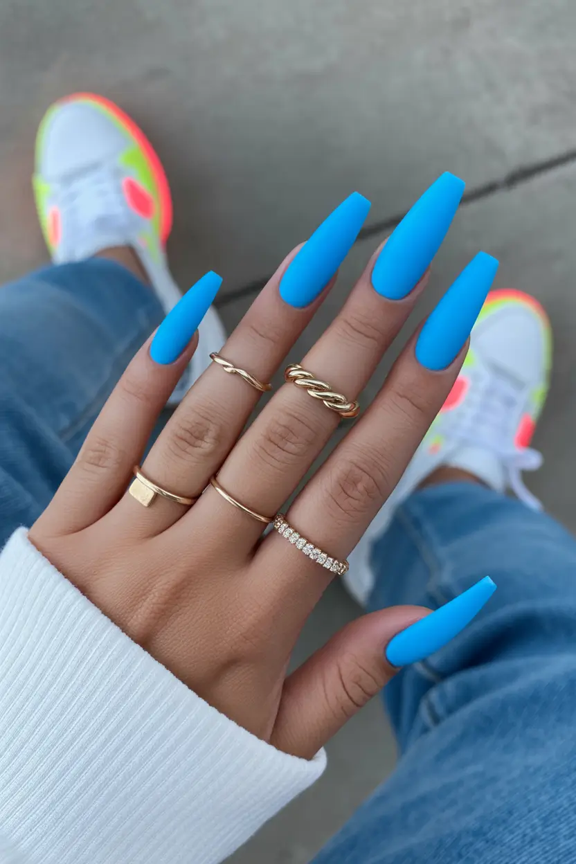 21 April nails colours 2026 Sky Blue Matte Coffin Nails With Sporty Energy