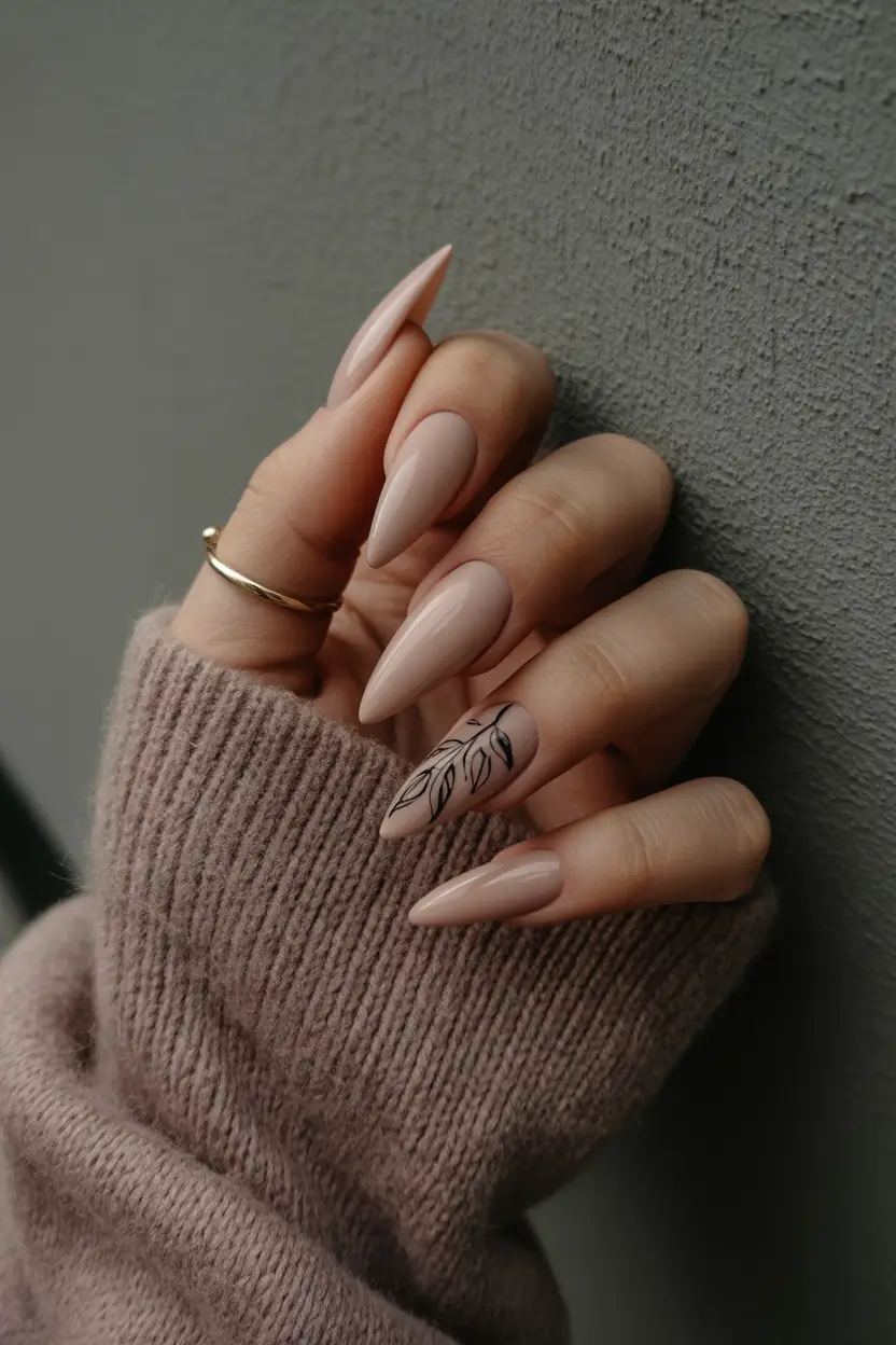 21 April nails colours 2026 Soft Almond Nude Nails With Minimal Botanical Art