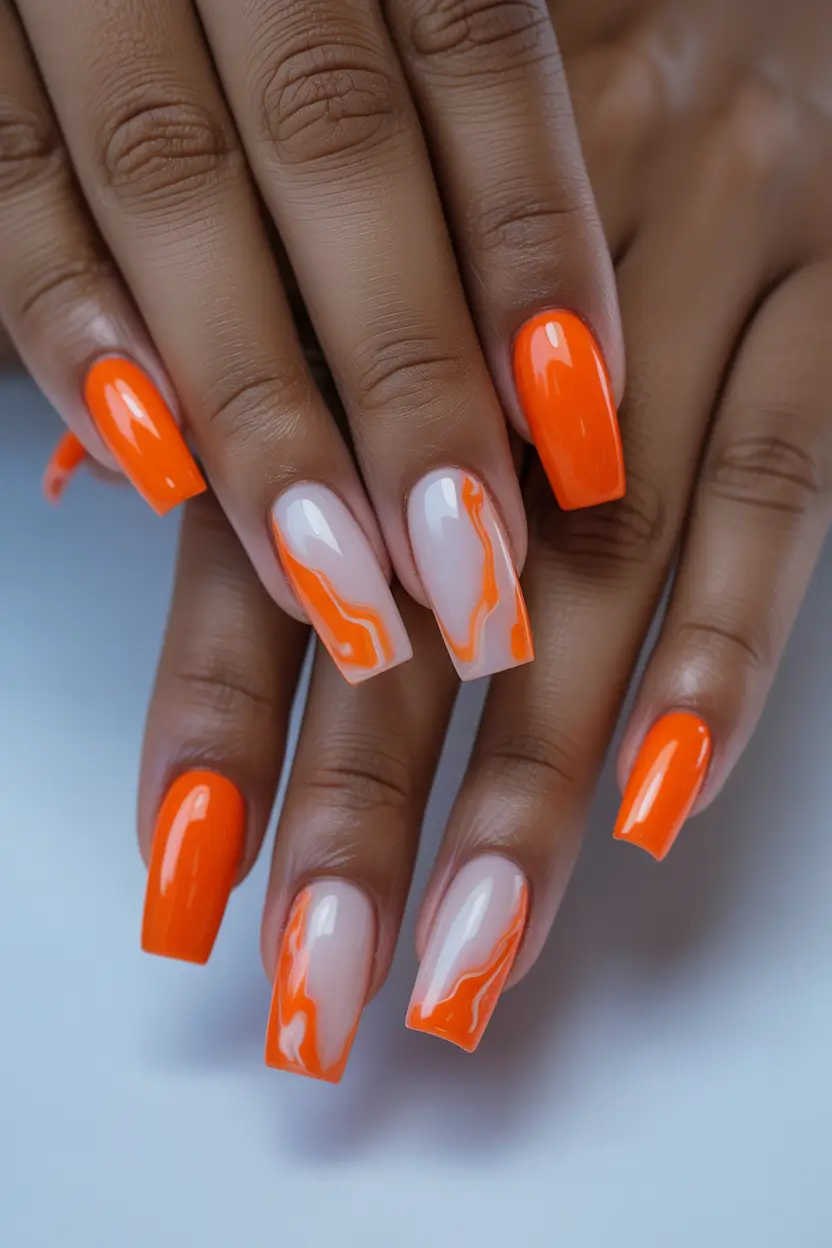21 April nails ideas 2026 Fresh Orange Marble For Playful Spring Energy