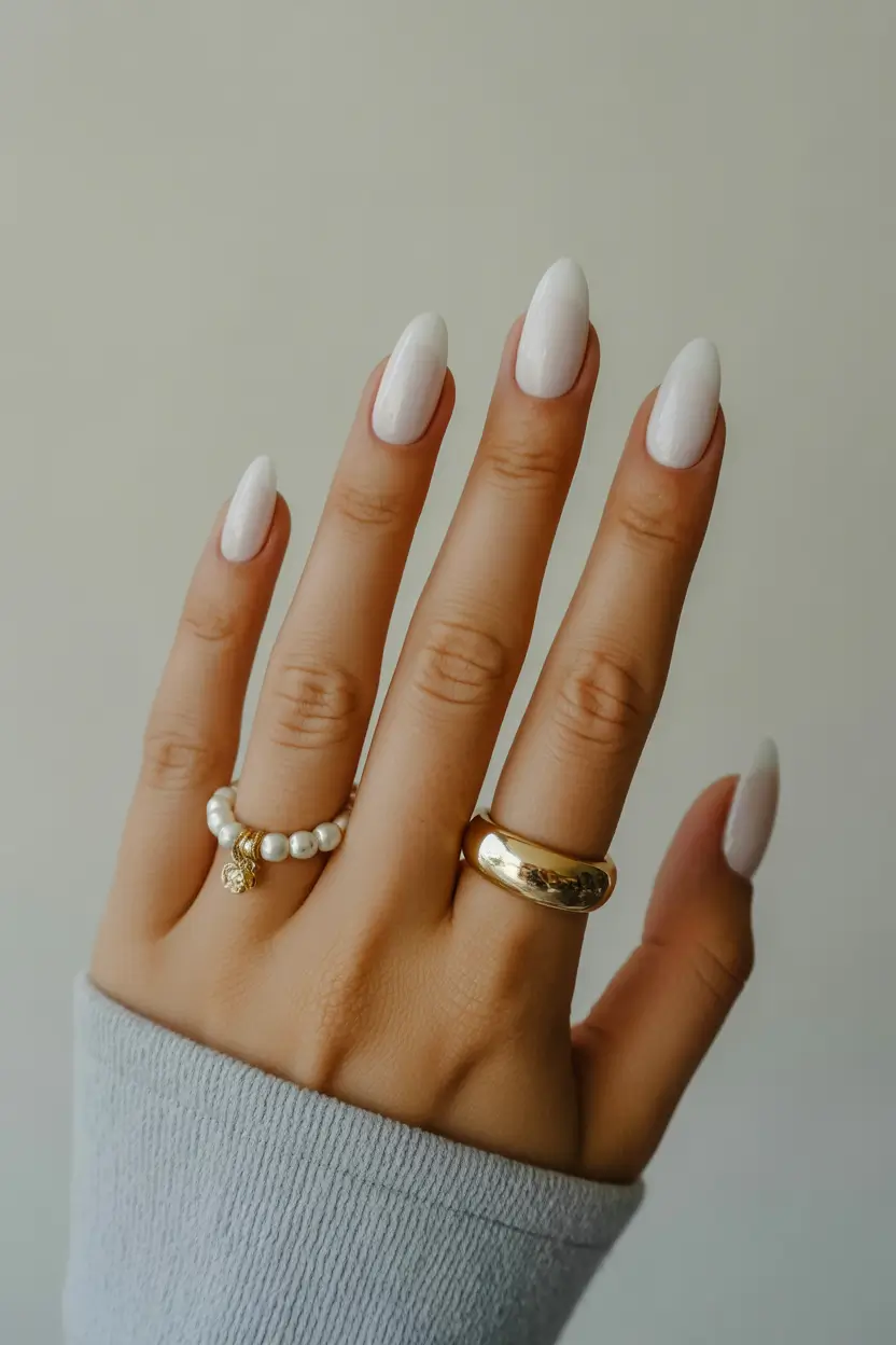 spring nails for tan skin Milky White Almond Nails With Minimal Elegance