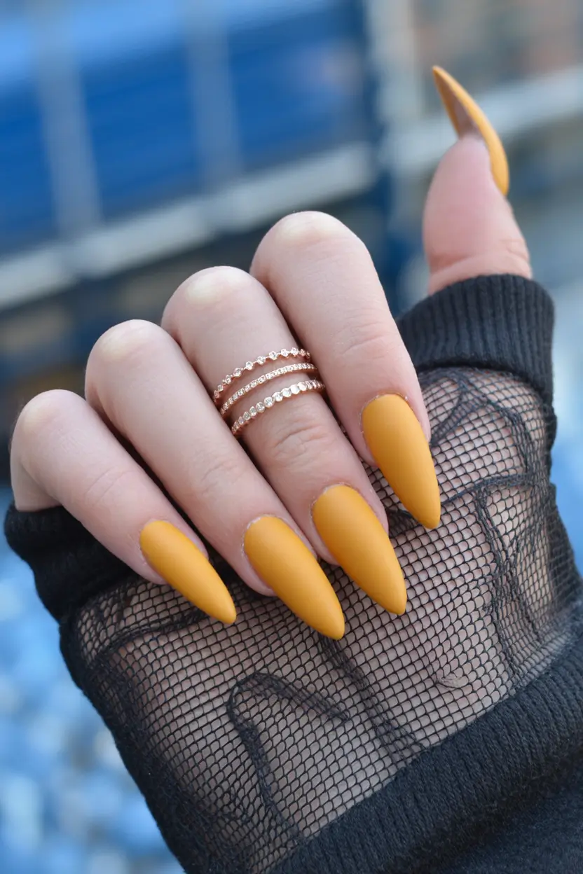 graduation nail color ideas 2026 Matte Mustard Almond Graduation Nails