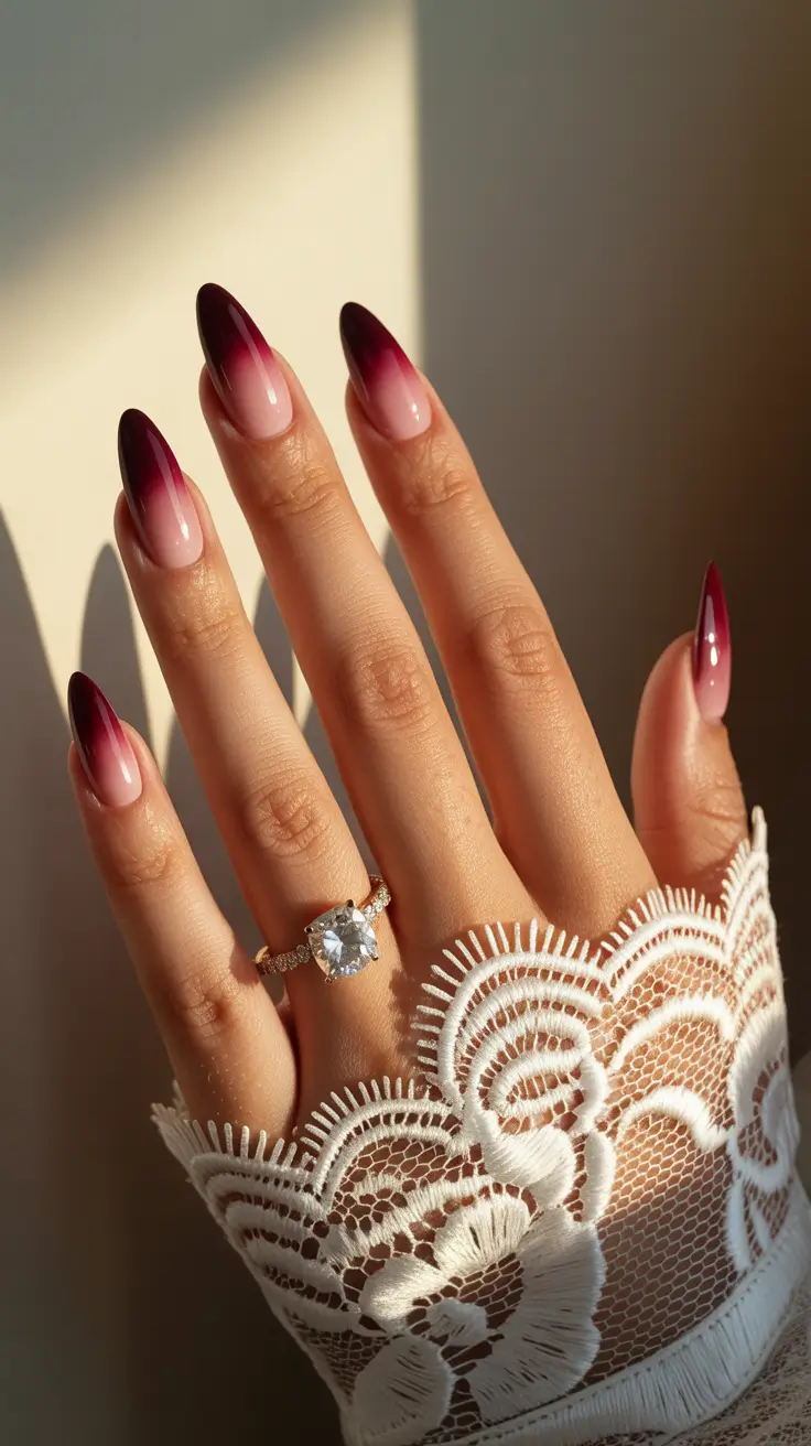graduation nails ideas 2026 Romantic Burgundy Ombre Almond Graduation Nails