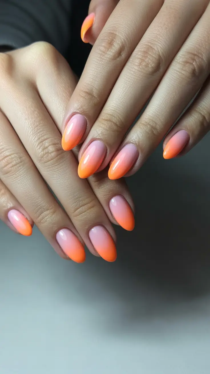 spring aura nails Peach Sunset Aura Almond Manicure