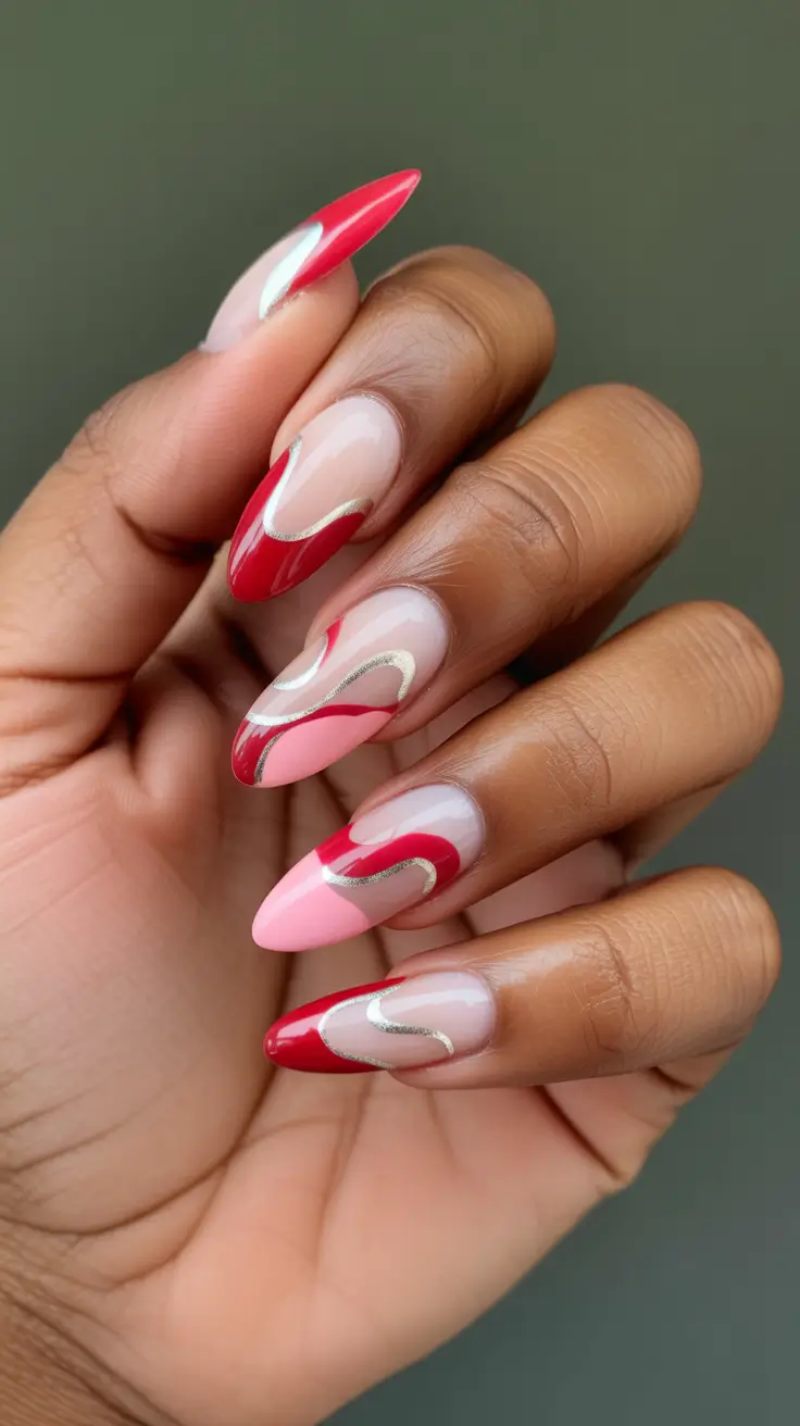 spring long nails Bold Red and Pink Swirl Nails with Metallic Accents
