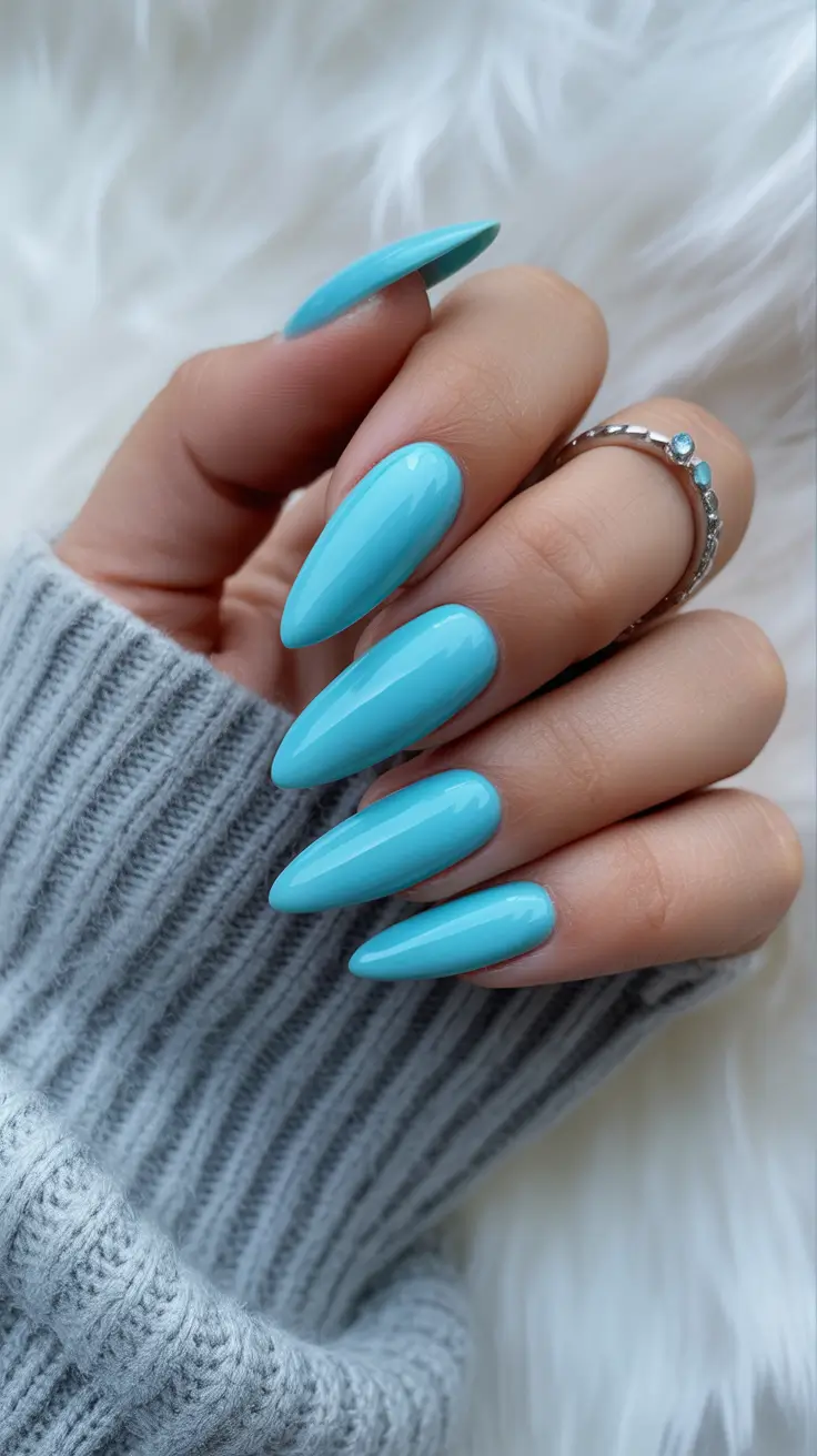 spring long nails Glossy Sky Blue Almond Nails for Clean Spring Minimalism
