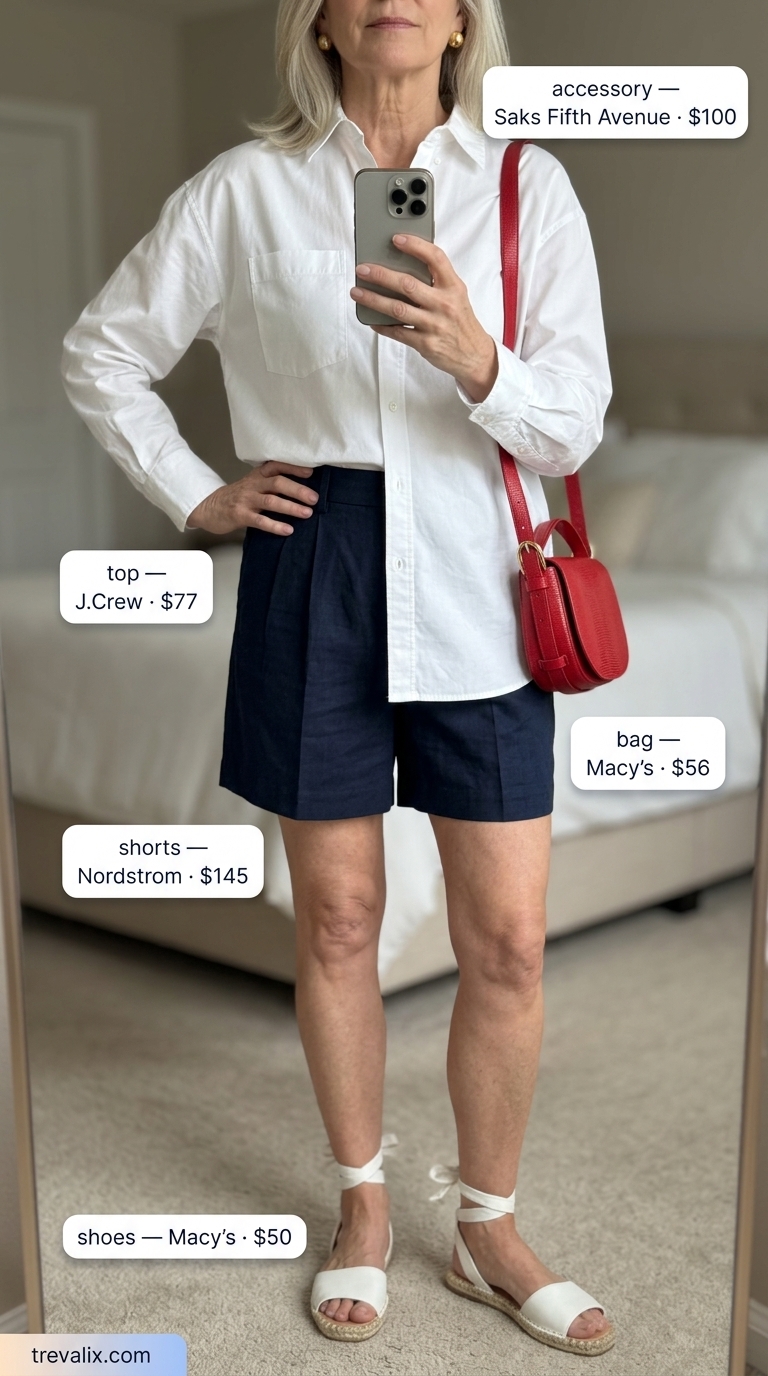 Classic navy linen shorts summer outfit for women over 60 2026. Nautical chic for seaside outings.