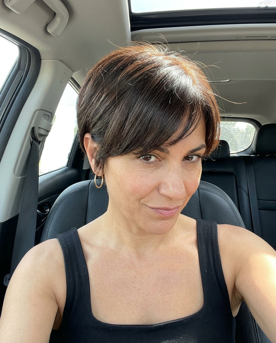short textured pixie haircut with rich espresso brunette, micro-bangs — sophisticated and edgy for daily wear