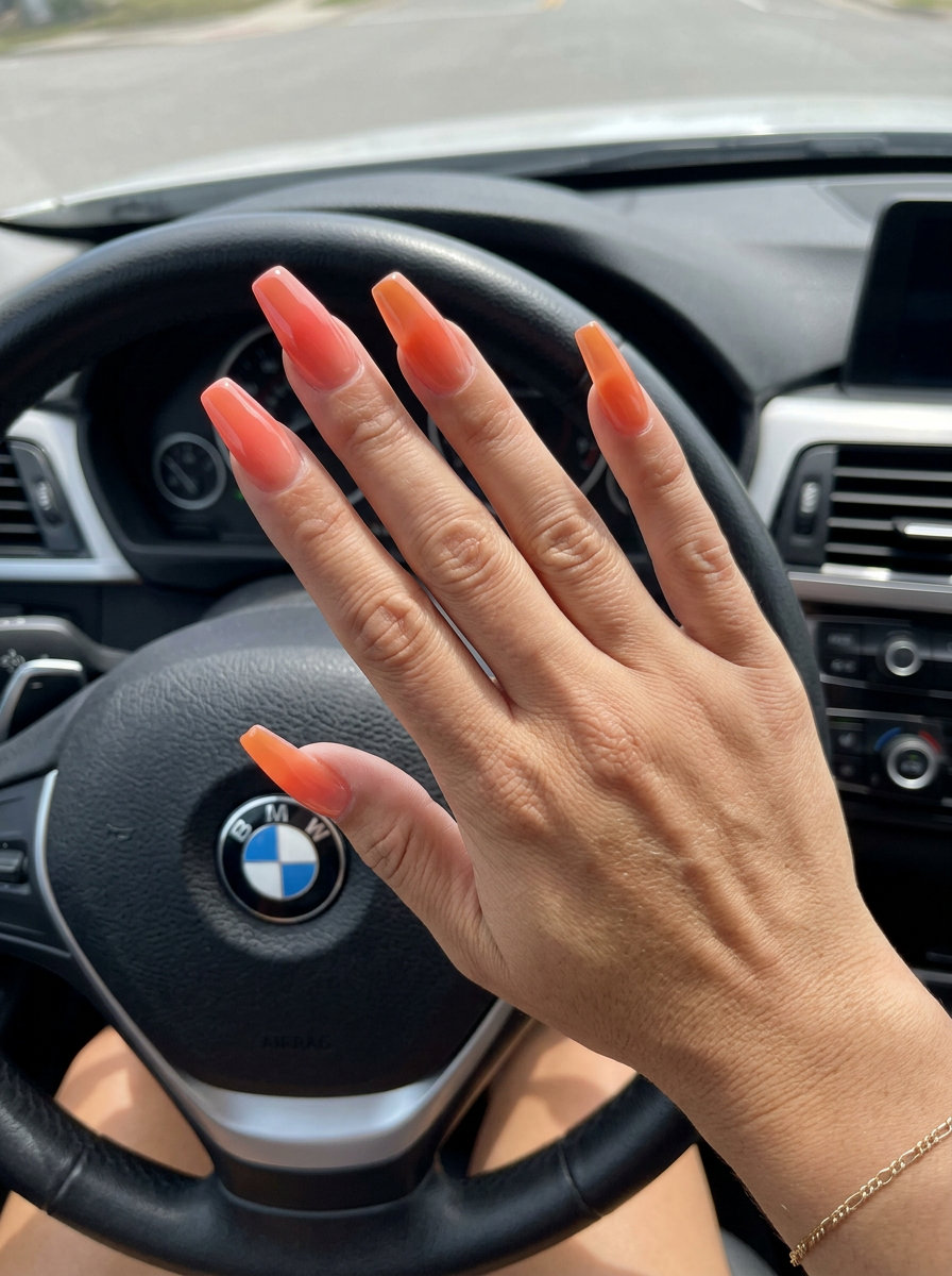 Coral Reef Jelly Ombre Manicure 2026 Coral Reef Jelly Ombre manicure colors summer 2026 for vacations & beach trips. Sultry coral to orange jelly gradient.