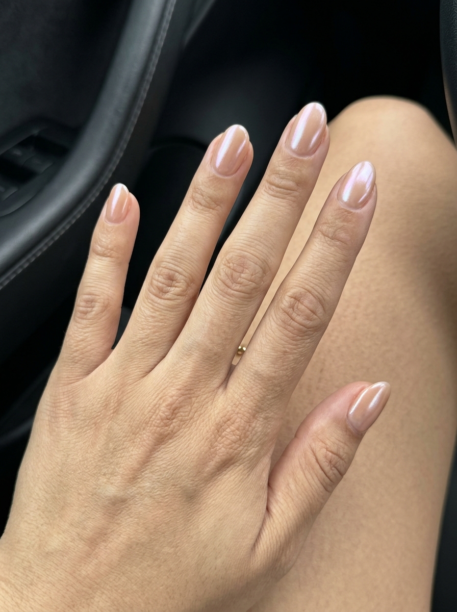 Sun-Kissed Nude Oval Nails 2026: Effortless Daily Style Sun-Kissed Glazed Nude Oval: Effortless daily nails with warm nude & pearlescent glaze. Oval summer nails 2026.