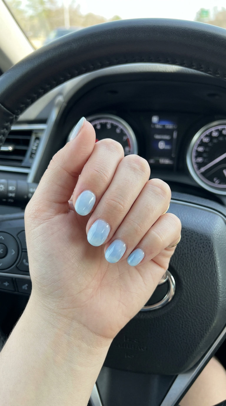 Short Round Summer Nails 2026: Blue Ombre Cloud Short round summer nails 2026: Blue ombre cloud dream effect in light to medium sky blue. Dreamy, calm style for vacation.