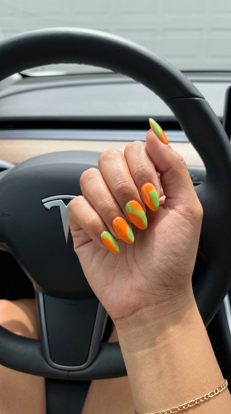 Vibrant Tangerine Color Block nails: Short-medium squoval with opaque tangerine and lime green for summer fruits nail art 2026.