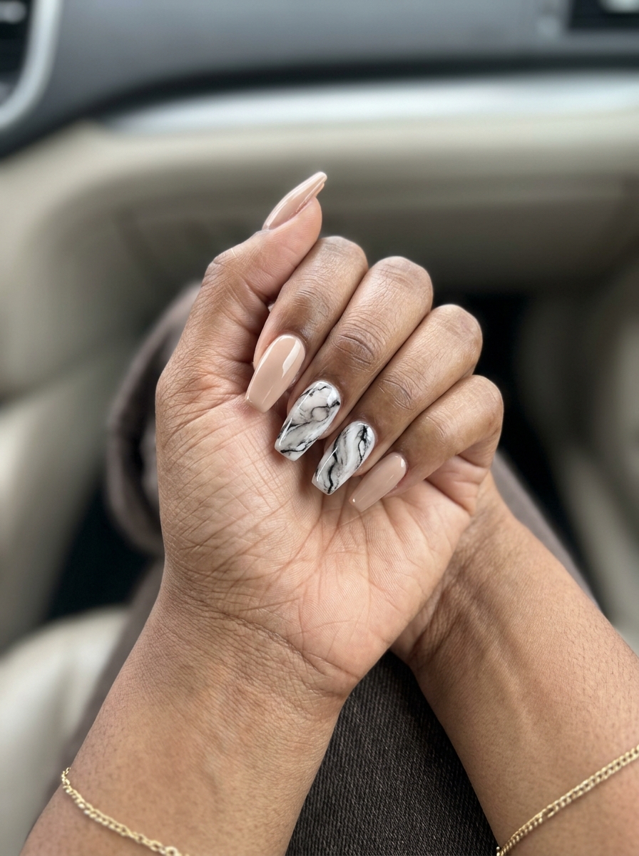 Monochrome Marble Chic Nails 2026 Monochrome marble almond nails in nude, black, white for summer nails for brown skin tone 2026. Elegant for weddings.