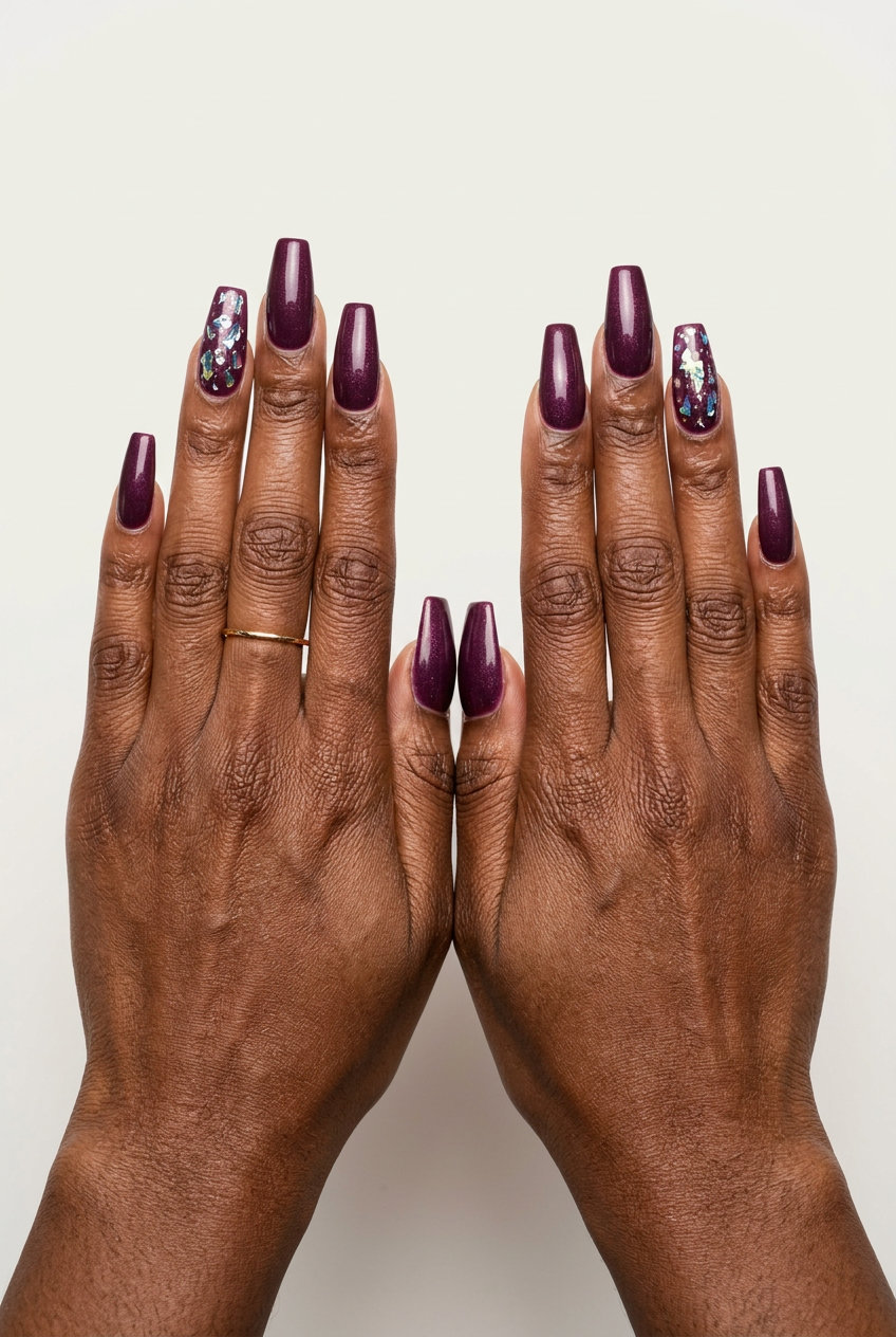Plum Shimmer Accent Nails 2026 Plum Shimmer Accent Nails with 3D Chrome Flakes for dark skin, ideal for date nights in 2026.