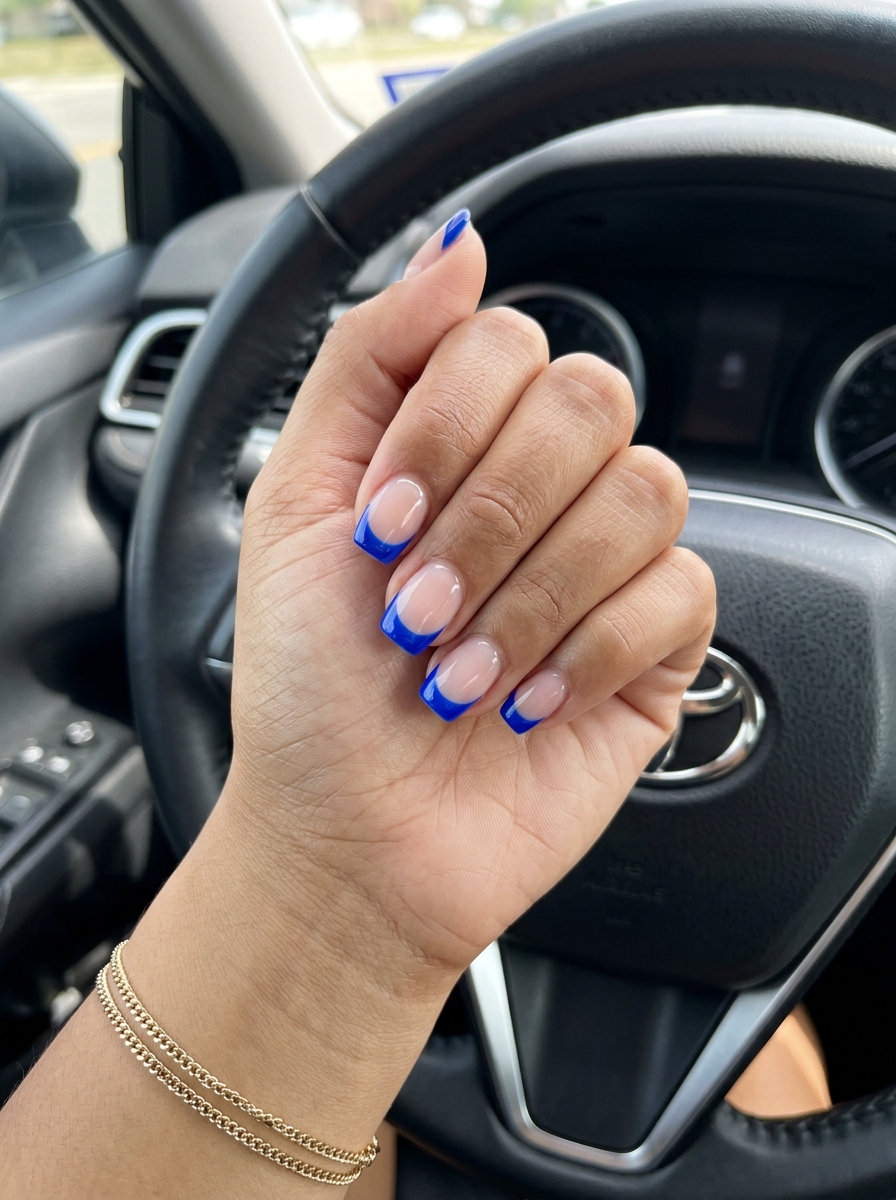 Edgy electric blue French manicure on short nails for summer nails french manicure 2026. Bold casual style.