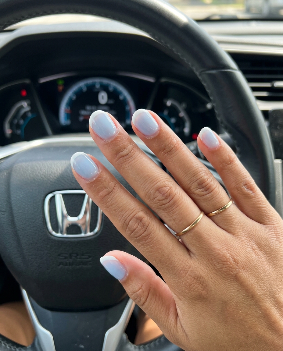 Sky Blue Sheer French: Clean and fresh baby blue nails with subtle white French tips for everyday wear.