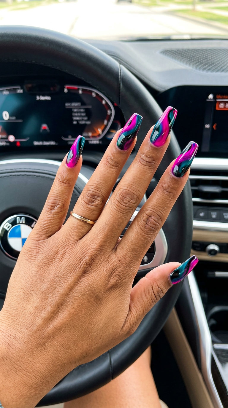 Fuchsia & Teal Abstract Swirls Coffin nails with bold, artistic patterns. Tropical nail designs 2026.