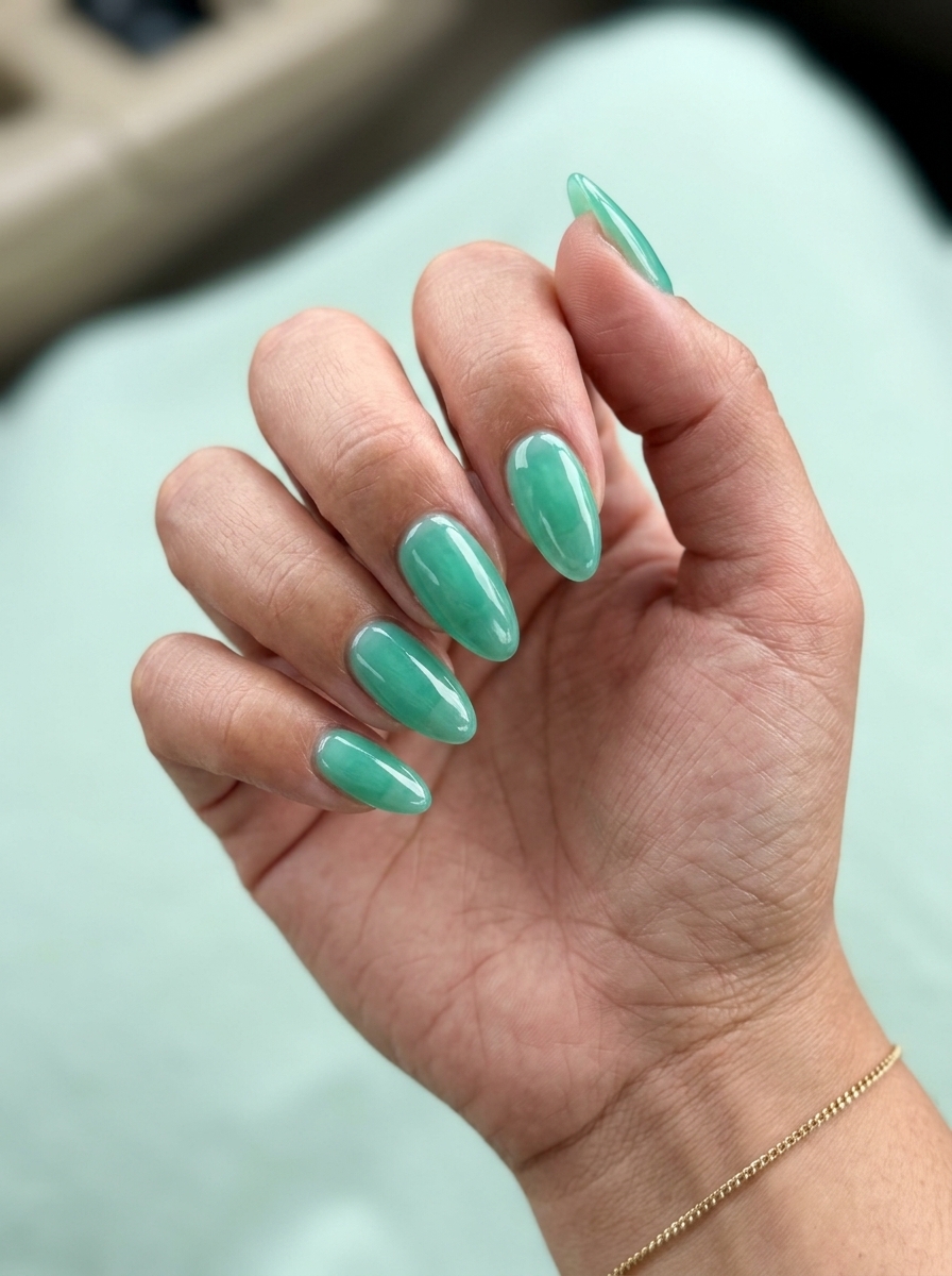 Sea Glass Jelly Almond nails for tropical summer 2026 casual outfits. Serene airy seafoam green.