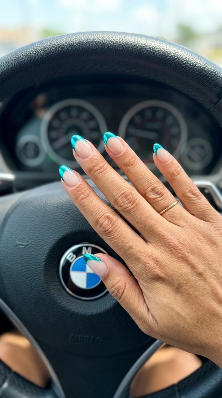Turquoise Metallic French Almond nails for tropical summer 2026 party outfits. Sophisticated metallic tips.