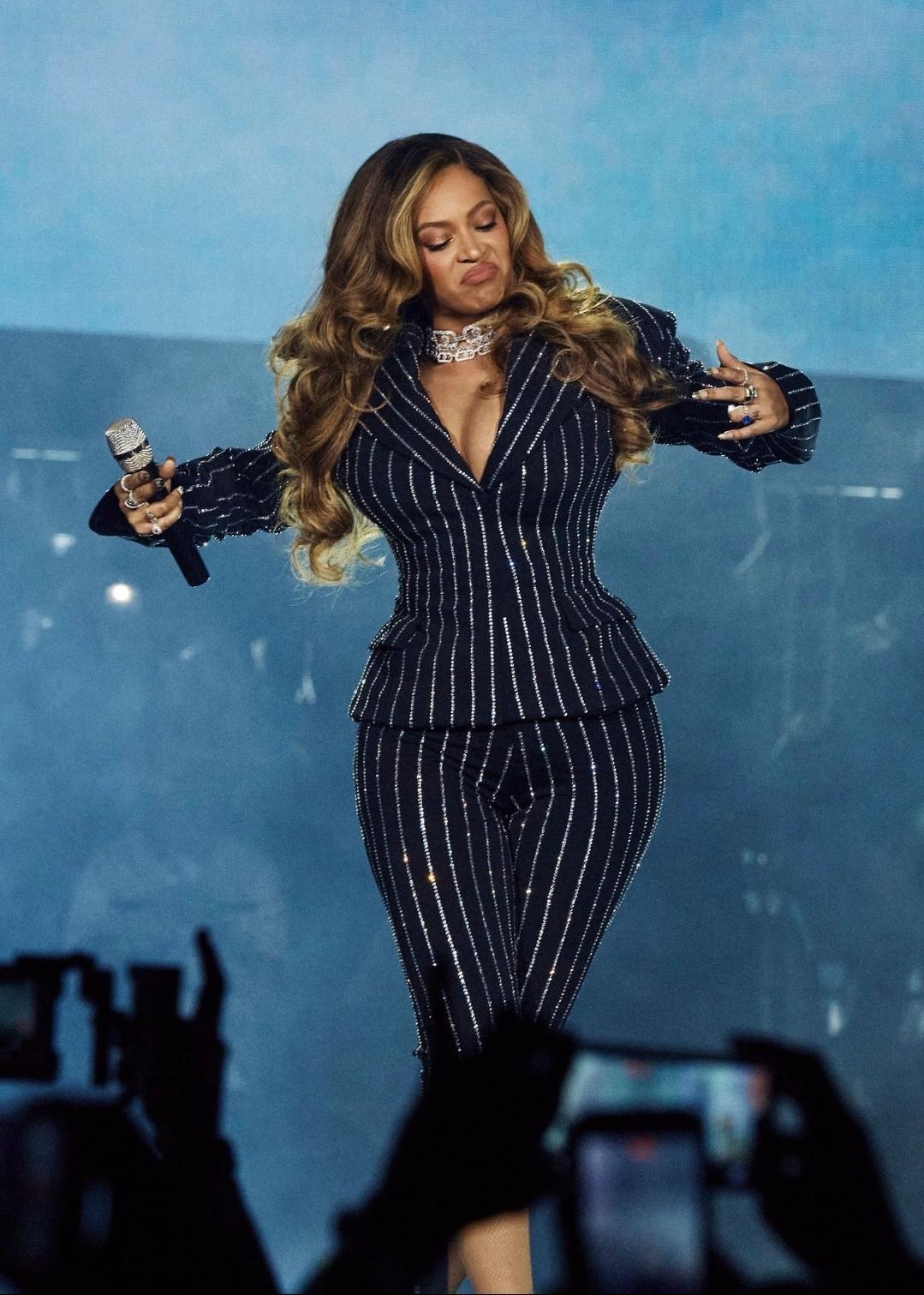 Sequin-Embellished Black Pinstripe Suit Sequin-Embellished Black Pinstripe Suit — Pinstripe Outfits 2027