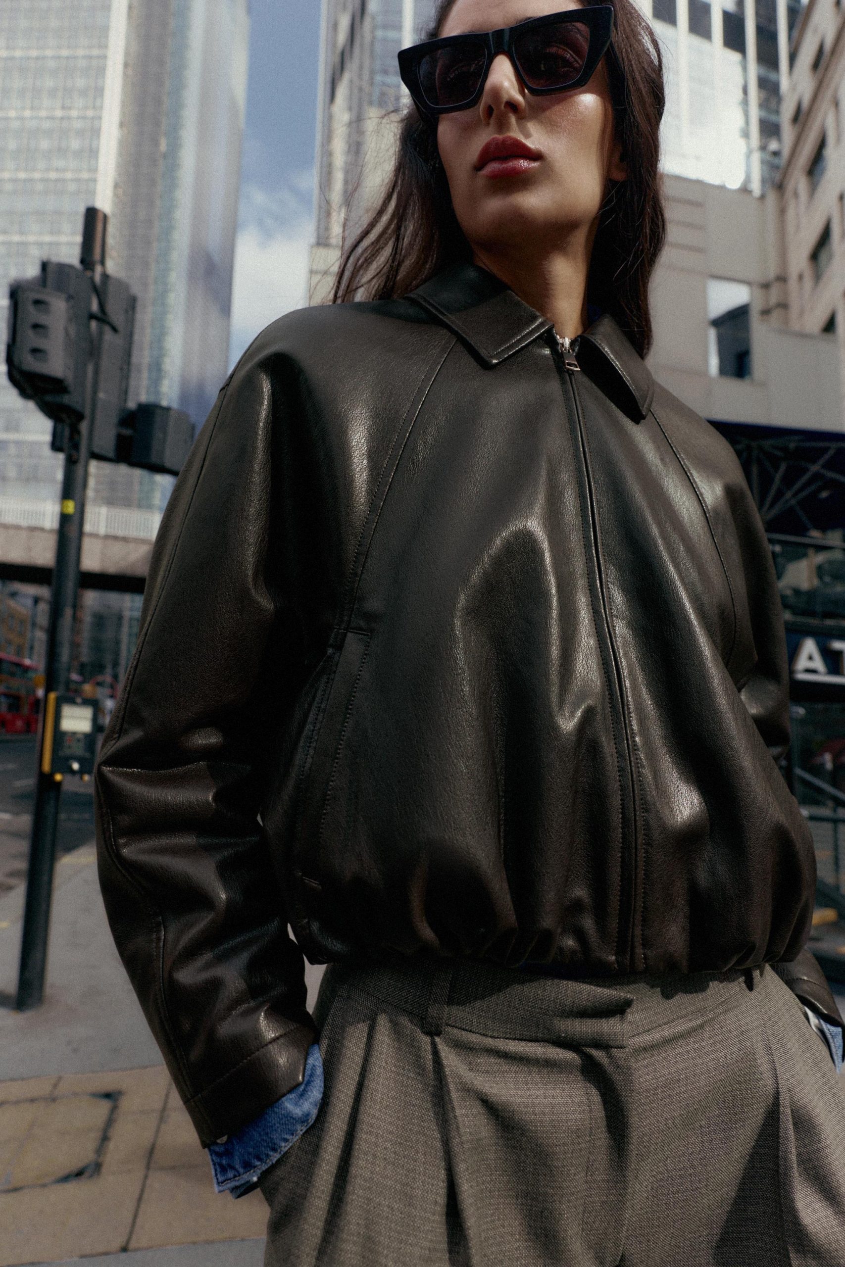 Edgy Black Leather Bomber Jacket with Denim and Grey Trousers Edgy Black Leather Bomber Jacket with Denim and Grey Trousers — Zara Outfits 2027