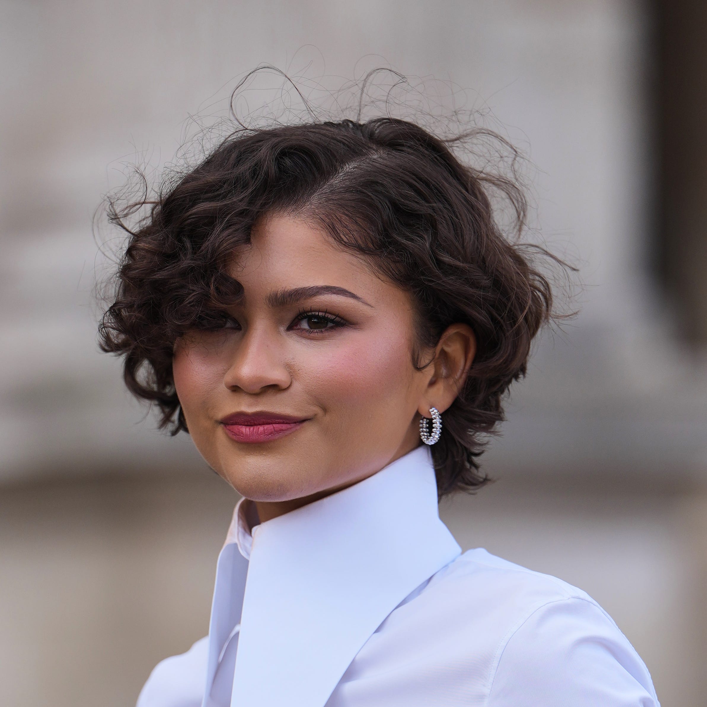 Short Layered Dark Brown Curls with Wispy Bangs Short Layered Dark Brown Curls with Wispy Bangs — Office Hairstyles 2027