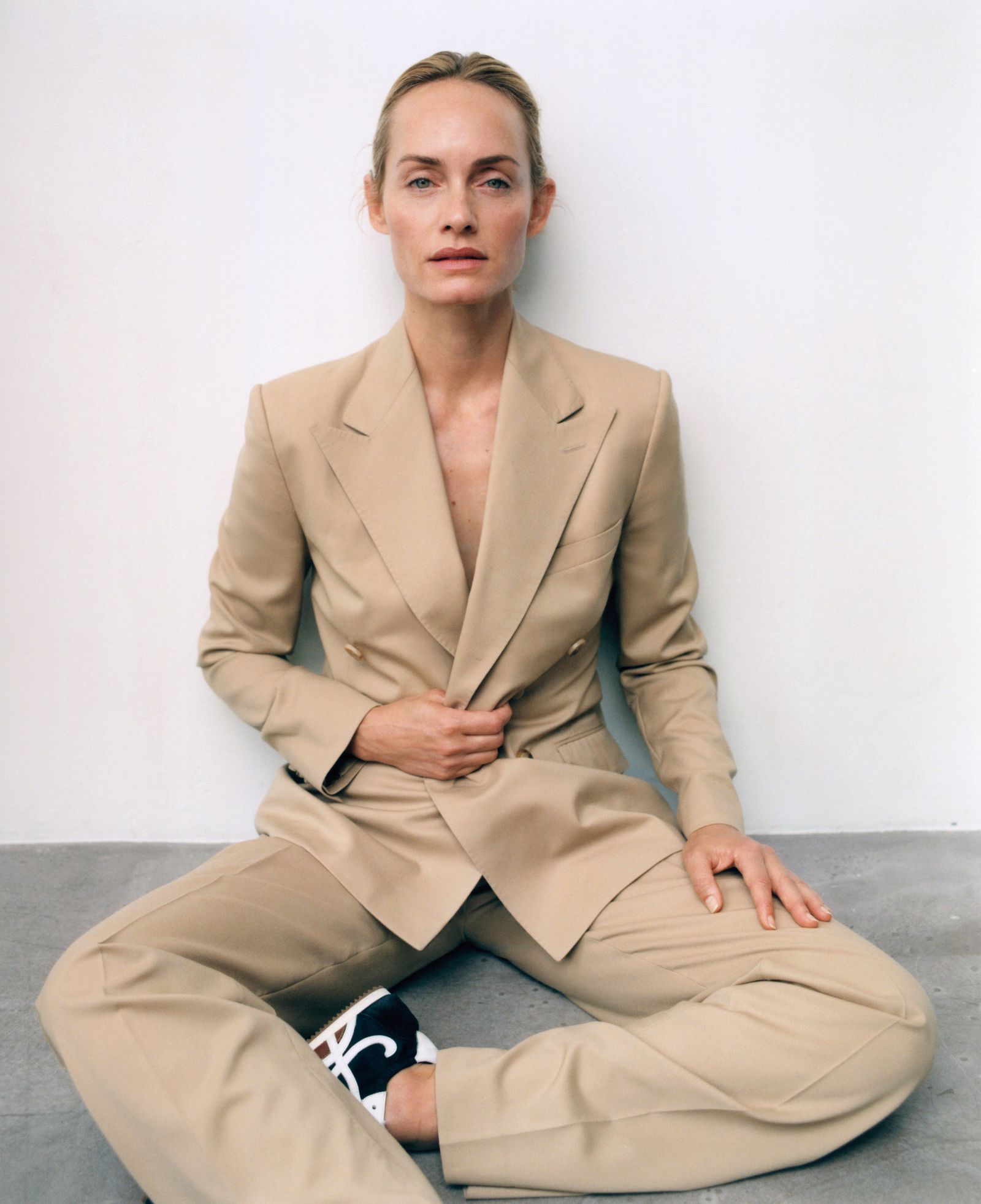 Editorial Chic: Beige Suit with Black and White Retro Sneakers Editorial Chic: Beige Suit with Black and White Retro Sneakers — Retro Sneakers Outfits 2027