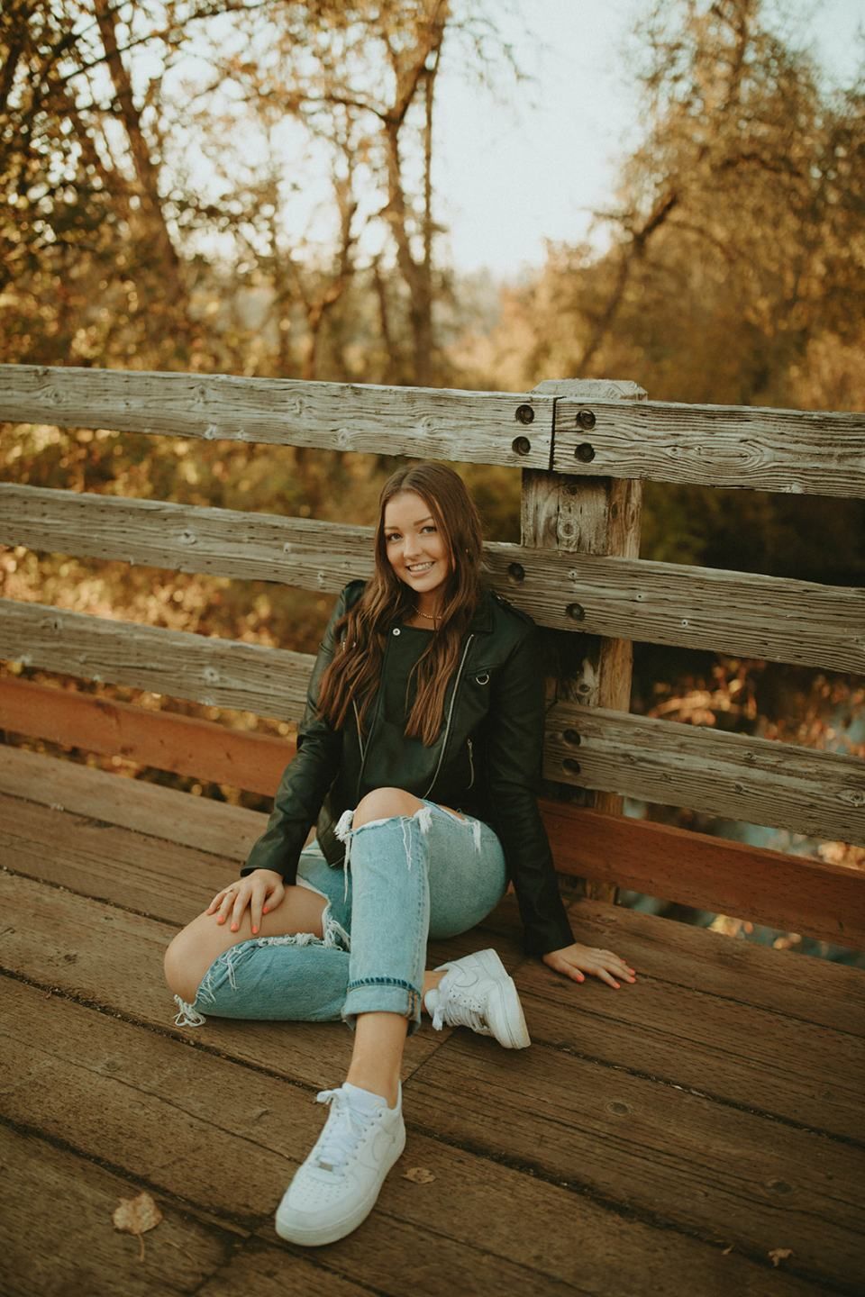 Edgy Outdoors: Moto Jacket, Dark Top, and Distressed Denim Edgy Outdoors: Moto Jacket, Dark Top, and Distressed Denim — Senior Photo Outfits 2027