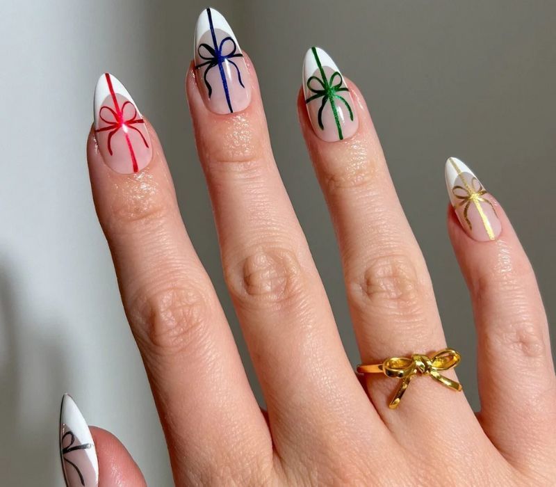 Gift Bow French Tip Almonds Gift Bow French Tip Almonds — Christmas Acrylic Nails 2026