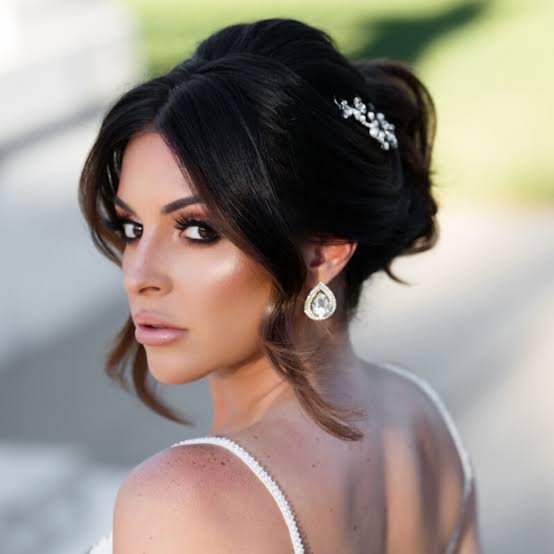 Neat Twisted Bun At The Nape — Wedding Updos 2027
