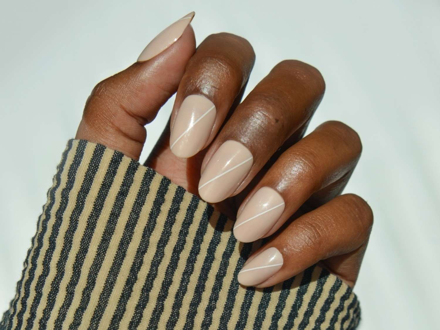 Medium Oval Beige with Subtle White Lines Medium Oval Beige with Subtle White Lines — Thin Line Nails 2027