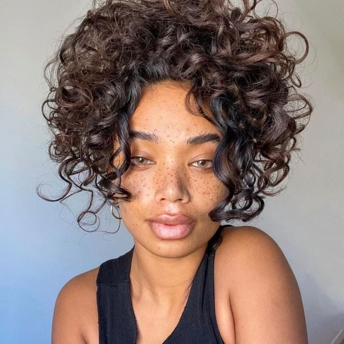 Layered Shoulder Curls With Curtain Bangs Layered Shoulder Curls With Curtain Bangs — Curly Hairstyles 2027 with Weave