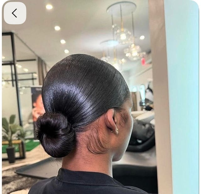 Shiny Black Sleek Bun With Wisps Shiny Black Sleek Bun With Wisps — Sleek Bun 2027