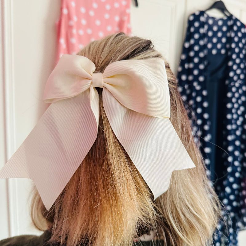 Half-Up Wavy Lob With Beige Bow — Big Bow Hairstyles 2027