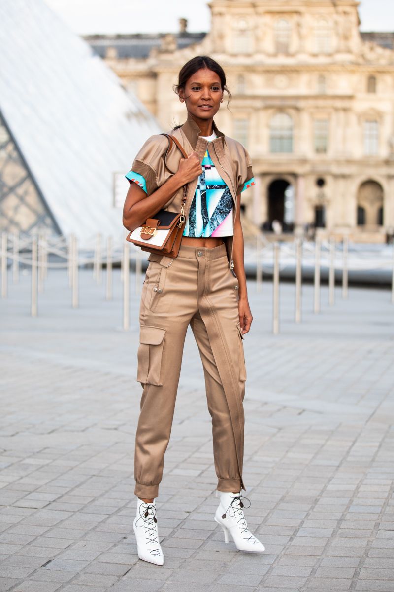 Street Style Chic: Khaki Cargos with Satin Bomber and White Boots Street Style Chic: Khaki Cargos with Satin Bomber and White Boots — Khaki Cargo Pants Outfits 2027