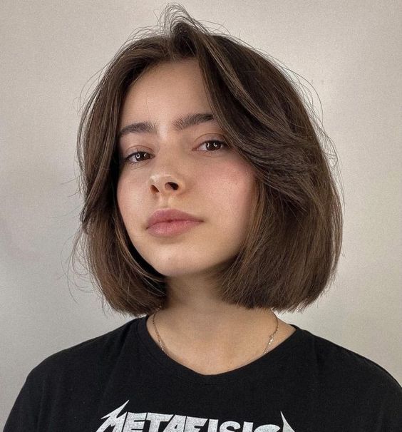 Chin Length Bob With Voluminous Curtain Bangs Chin Length Bob With Voluminous Curtain Bangs — Bob 2027 with Curtain Bangs