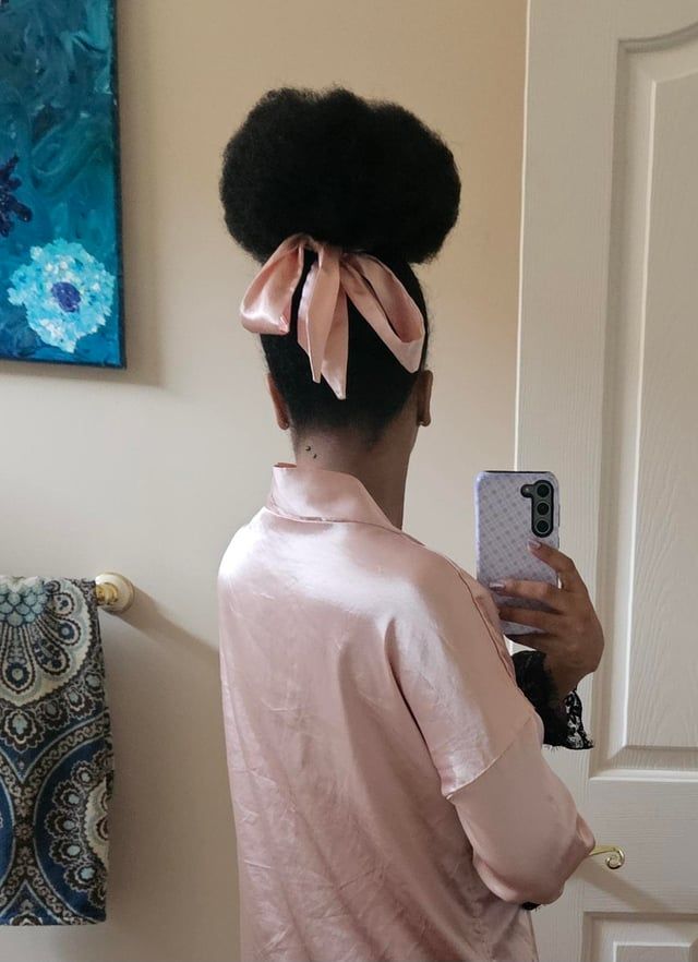 High Bun With Black Satin Bow — Big Bow Hairstyles 2027
