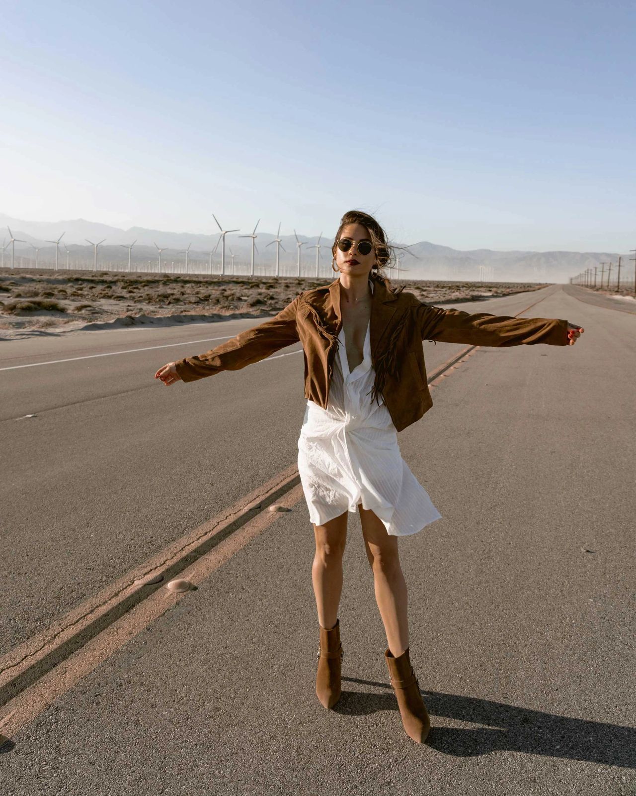 Festival Freedom: Brown Suede Fringe Jacket with White Mini Dress Festival Freedom: Brown Suede Fringe Jacket with White Mini Dress — Fringe Jacket Outfits 2027